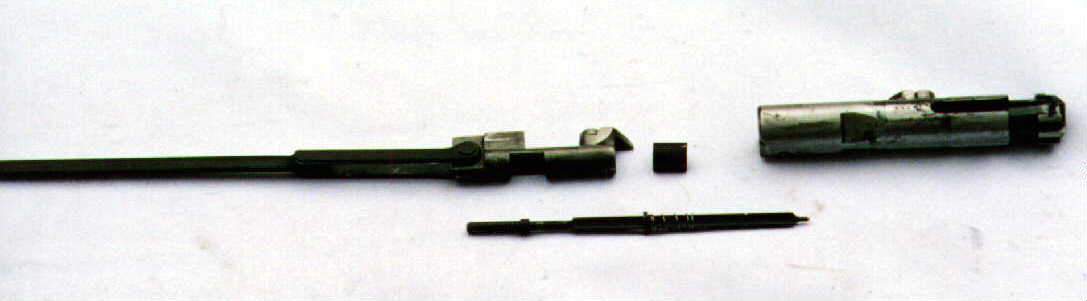 Disassembled bolt showing the 3 componants
