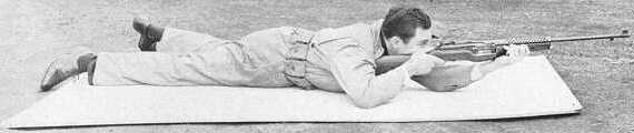 Mel Johnson firing in prone position